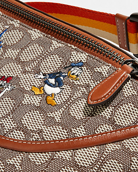 DISNEY X COACH LEAGUE BELT BAG IN SIGNATURE TEXTILE JACQUARD WITH MICKEY MOUSE AND FRIENDS EMBROIDERY